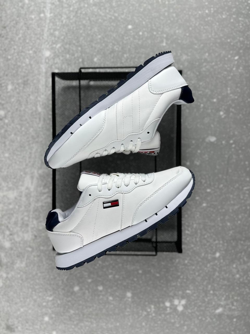 TOMMY TM ENVOLVE