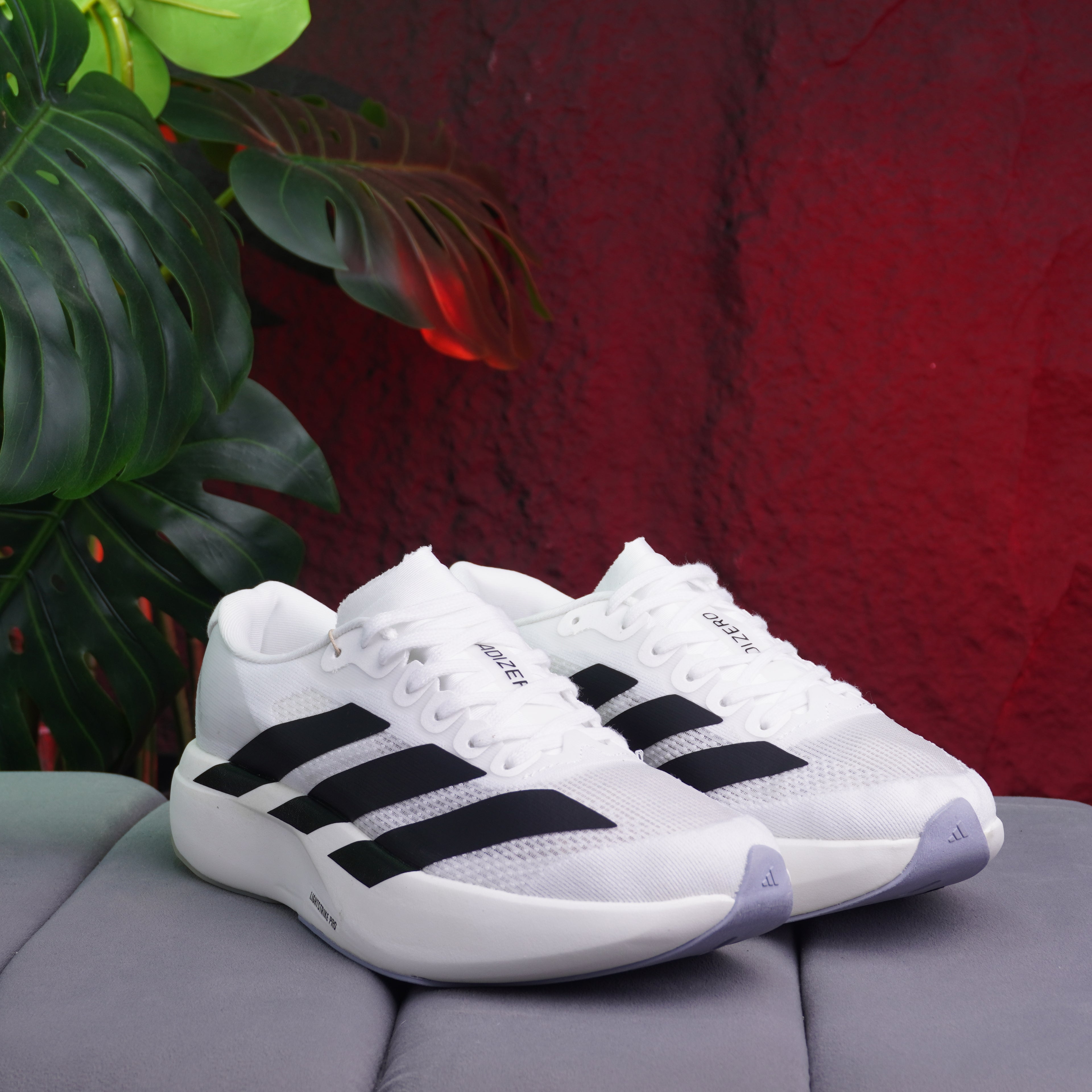 ADIZERO EVO DAMA BLANCO NEGRO