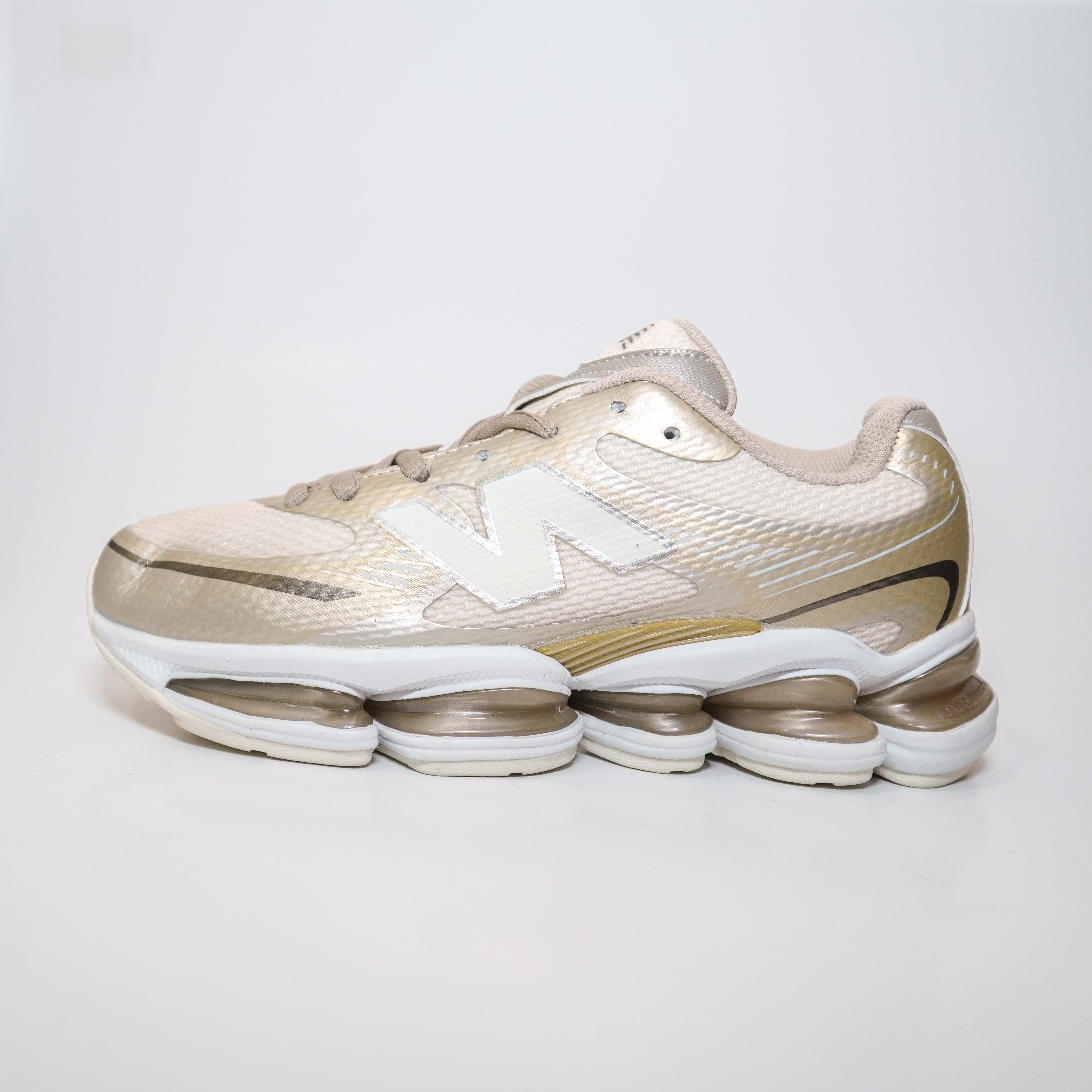 NEW BALANCE 2000 DAMA DORADO BLANCO