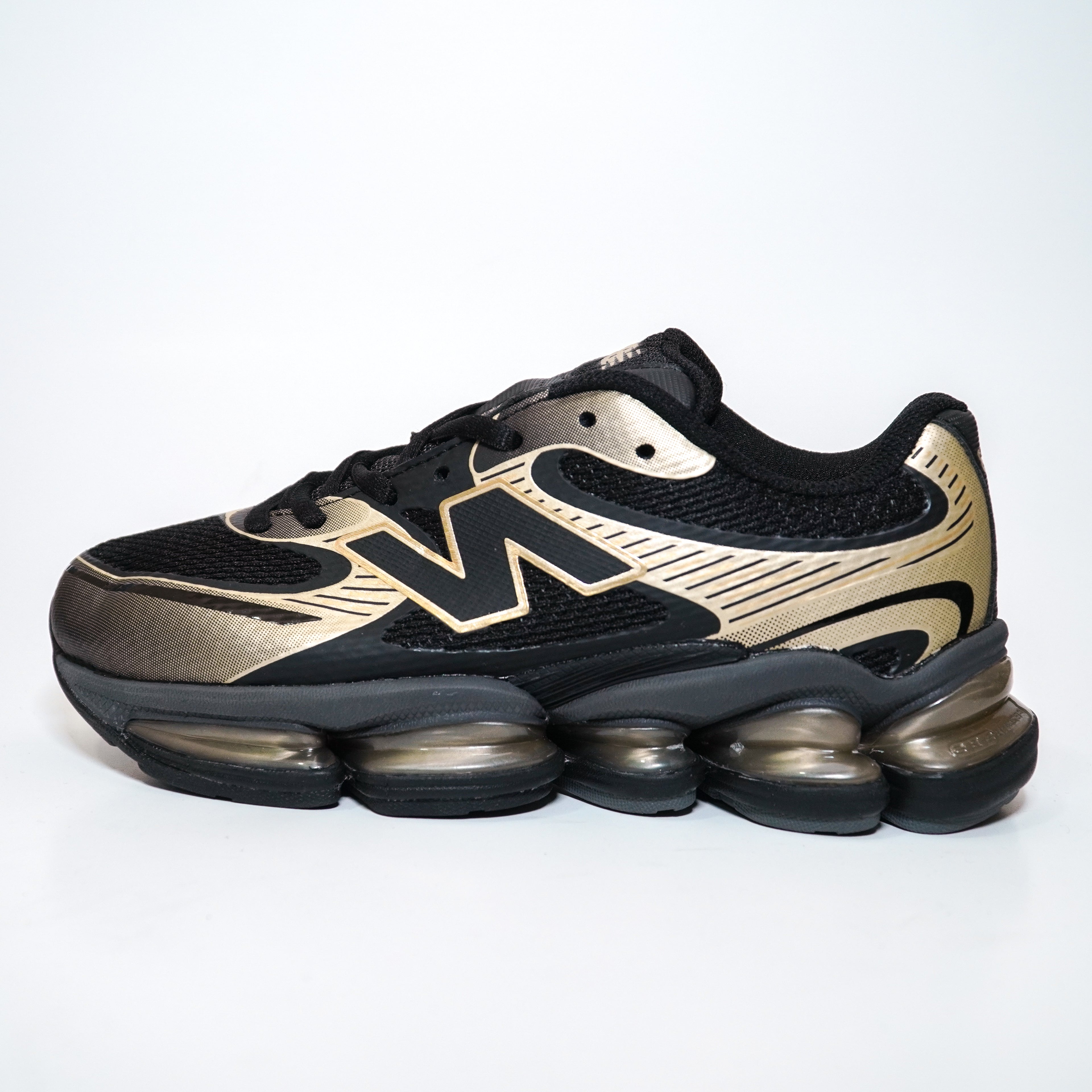 NEW BALANCE 2000 DAMA NEGRO DORADO