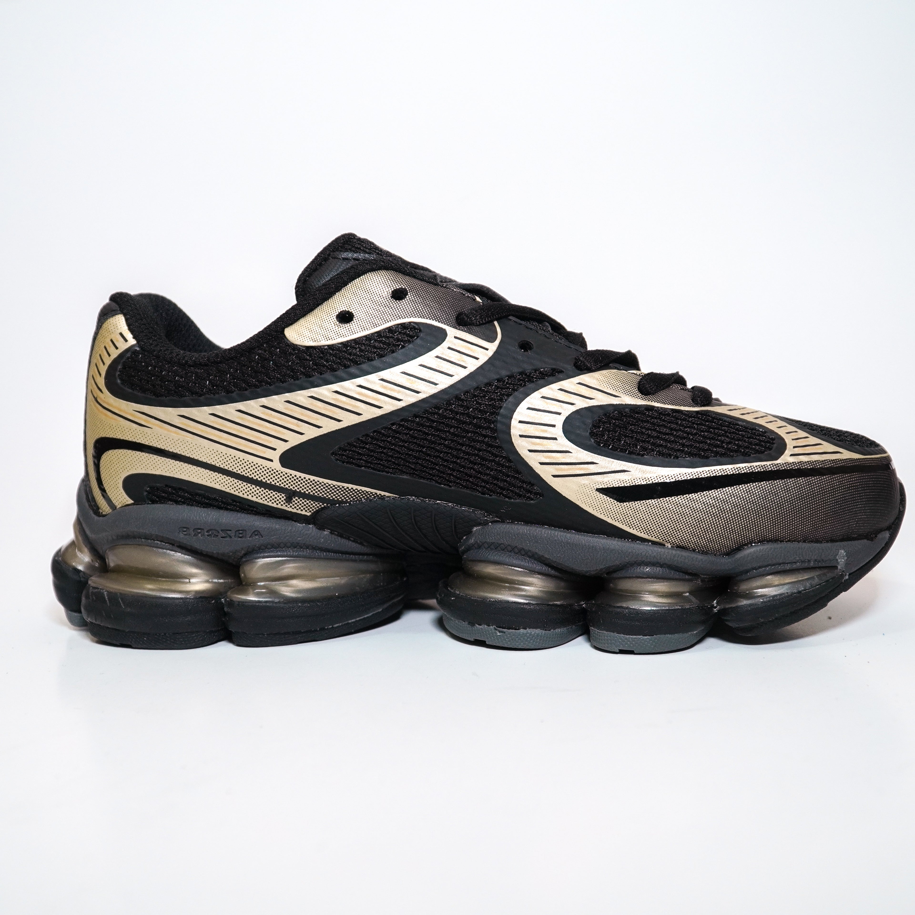 NEW BALANCE 2000 DAMA NEGRO DORADO