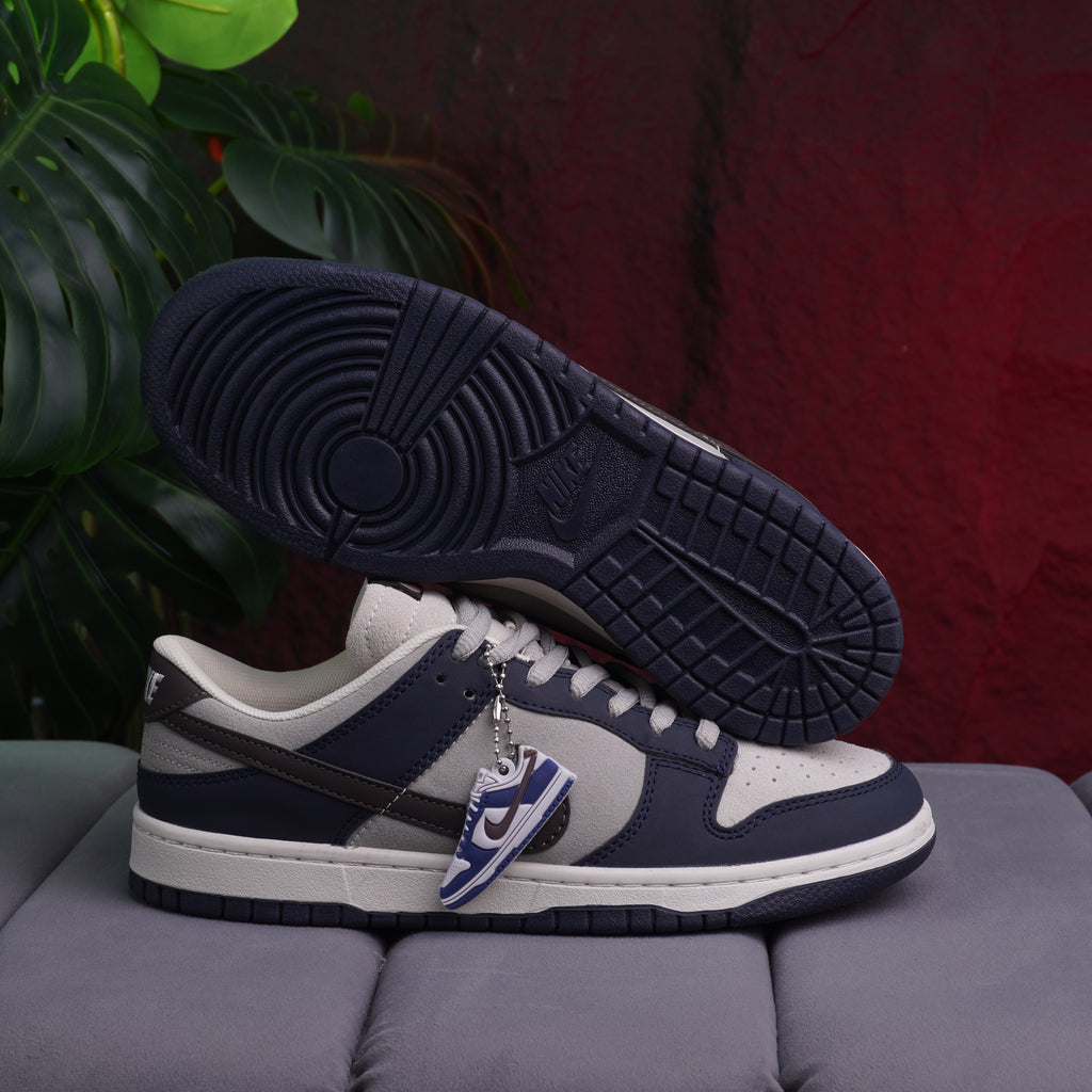 NIKE DUNK LOW CABALLERO GRIS AZUL
